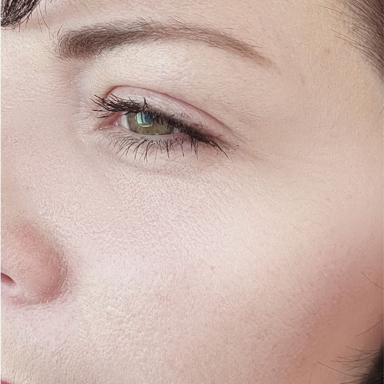 Close-up of a person's eye without wrinkles on the skin