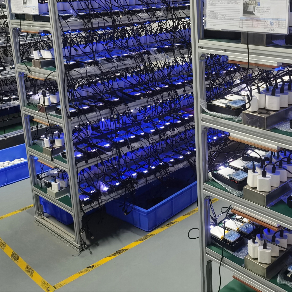 A warehouse with shelves containing electronic equipment