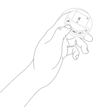 A hand holding a body sculpting device with a screen