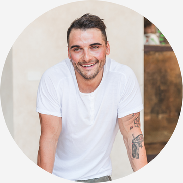 A dad wearing a white t-shirt 