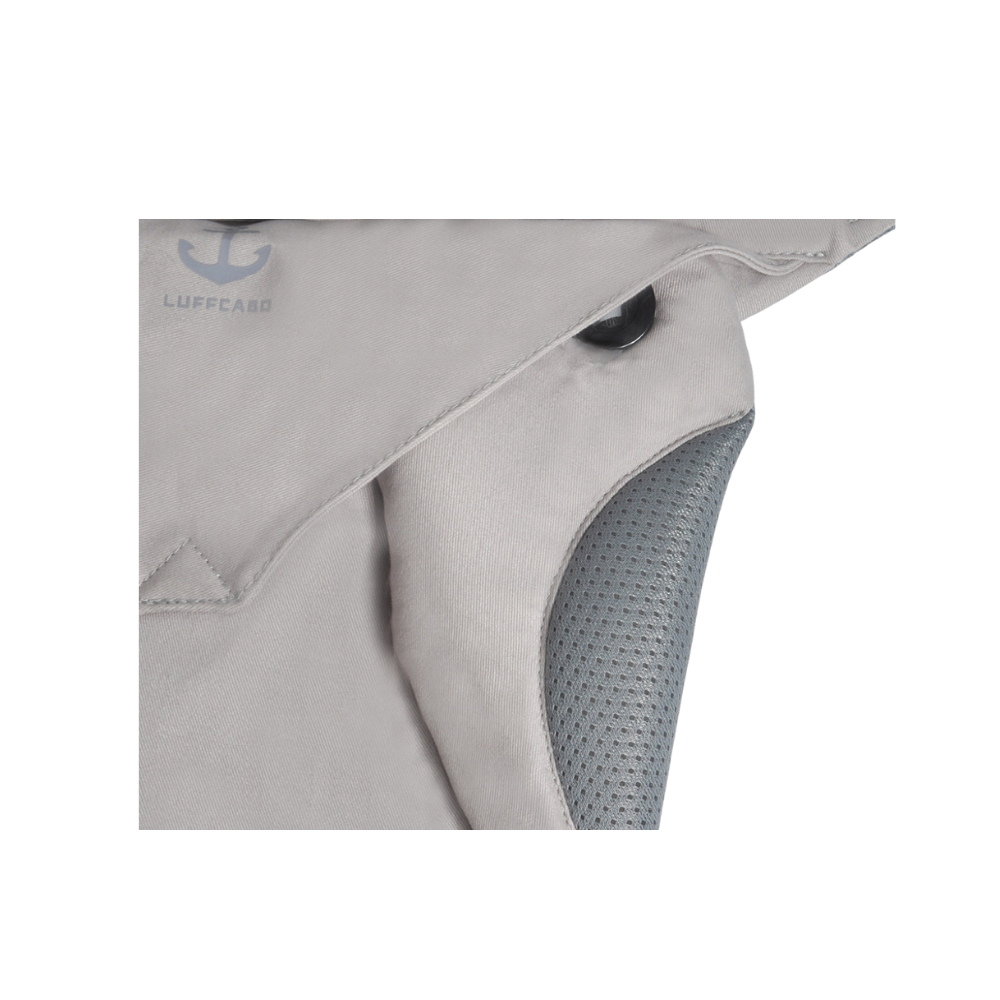 A gray fabric of the baby carrier with mesh detailing and finishes