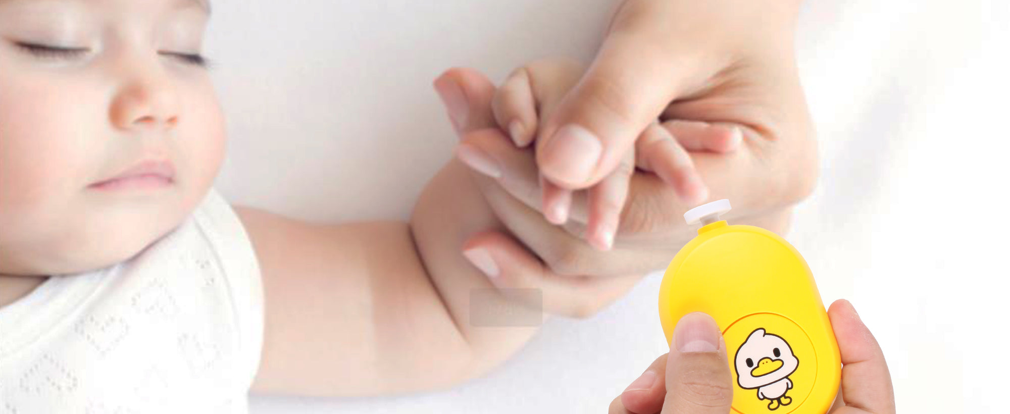 Parent holds a baby nail file to grind baby's nail when baby is sleeping