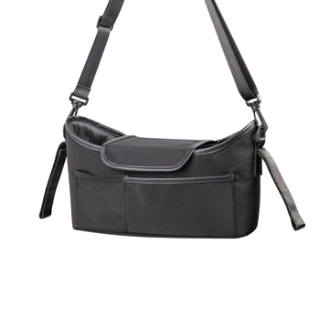 Black crossbody bag designed with multiple compartments for organized, easy-access storage of daily essentials, perfect for urban commutes or travel