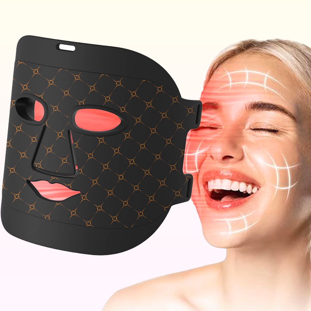 A woman using an LED light therapy facial mask for anti-aging and skin care at home