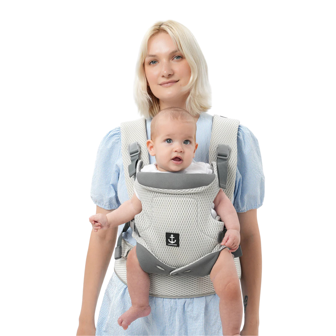 Mom holding a baby in a mesh baby carrier
