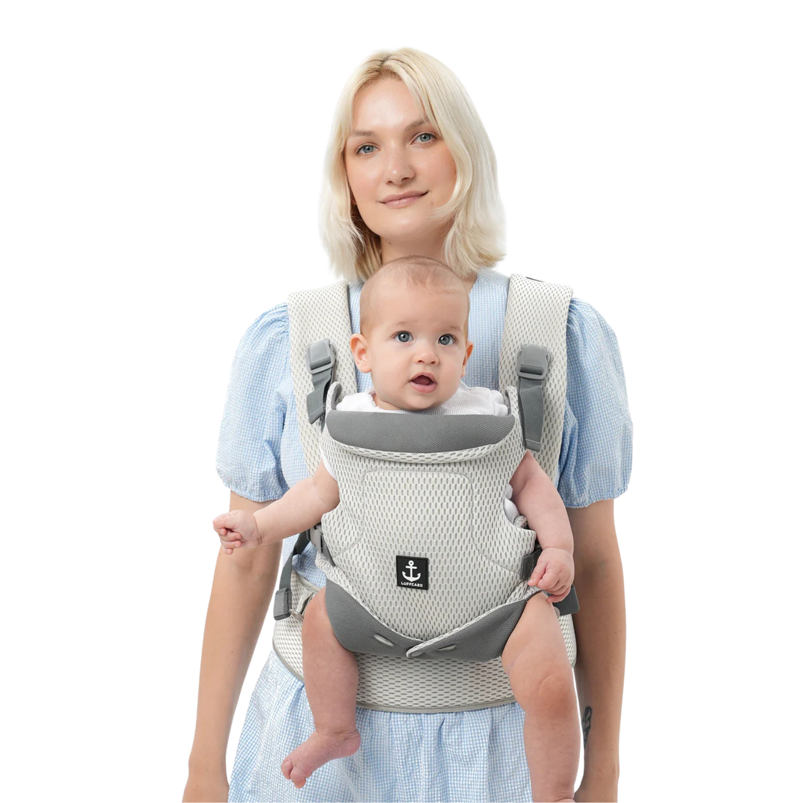 A mom holding a baby in a mesh baby carrier for newborn