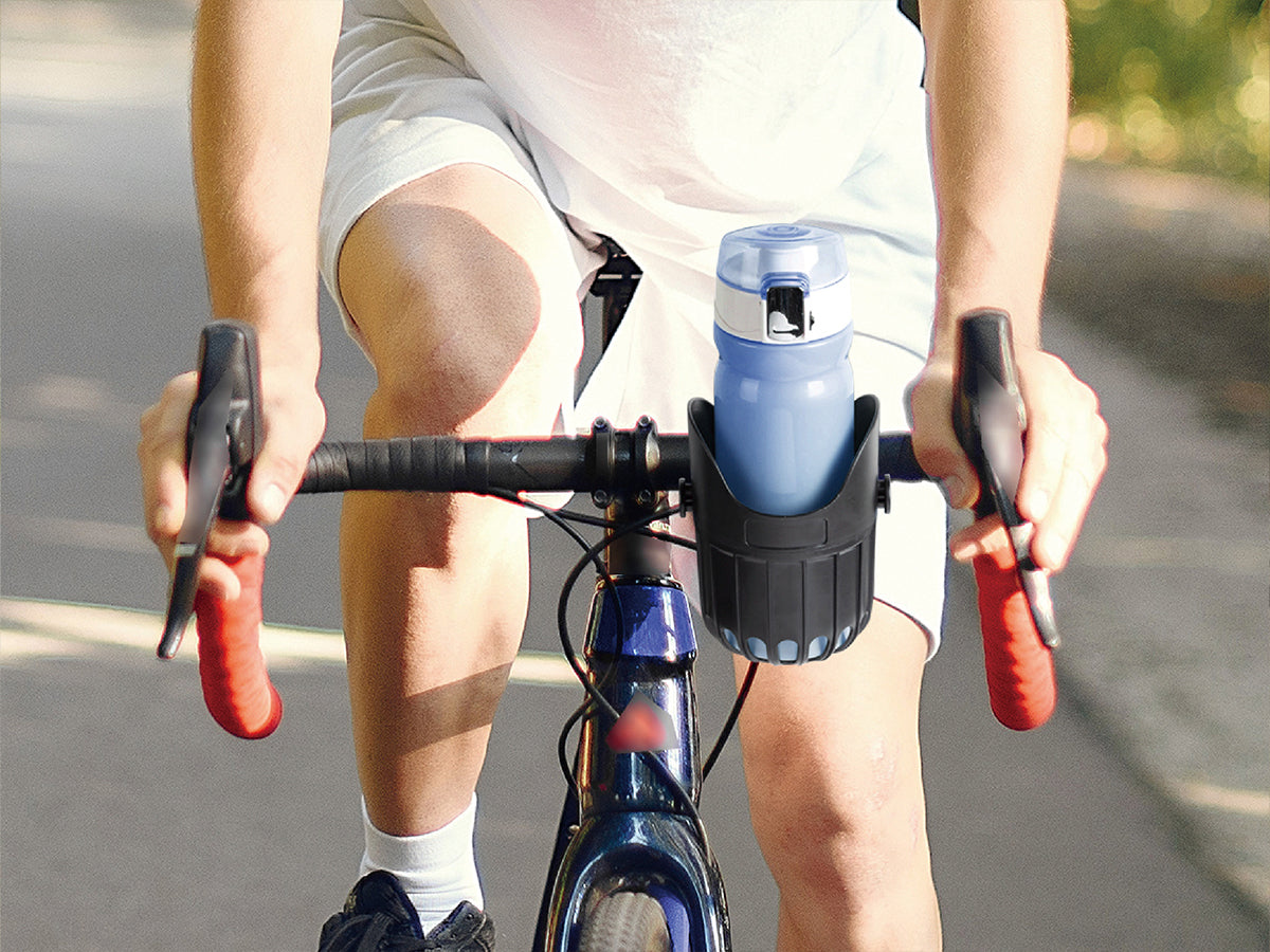 LUFFCABO cup holder attached to bike, ideal for holding bottles during rides, a versatile outdoor accessory