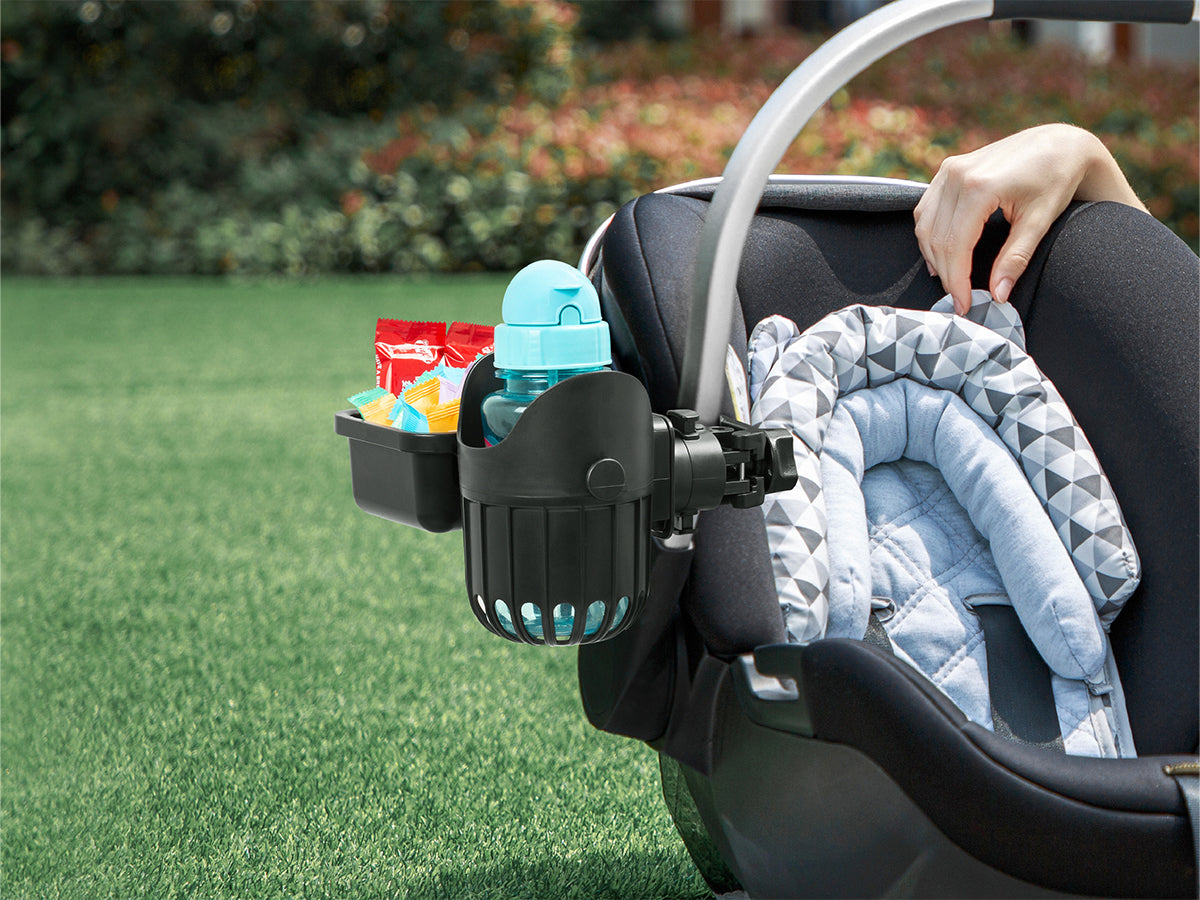 LUFFCABO detachable stroller snack tray with cup holder, attached to a car seat, ideal stroller accessory