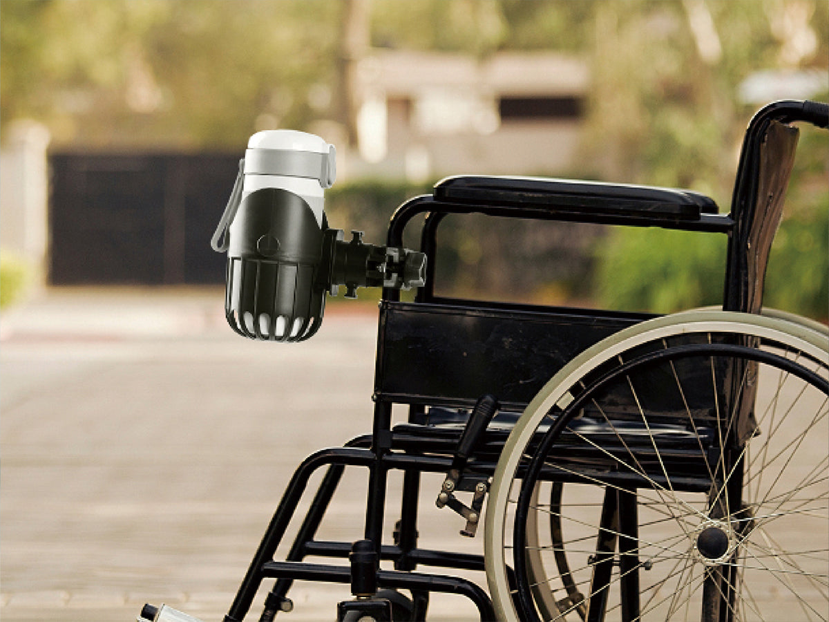 LUFFCABO wheelchair cup holder, securely attached to a wheelchair