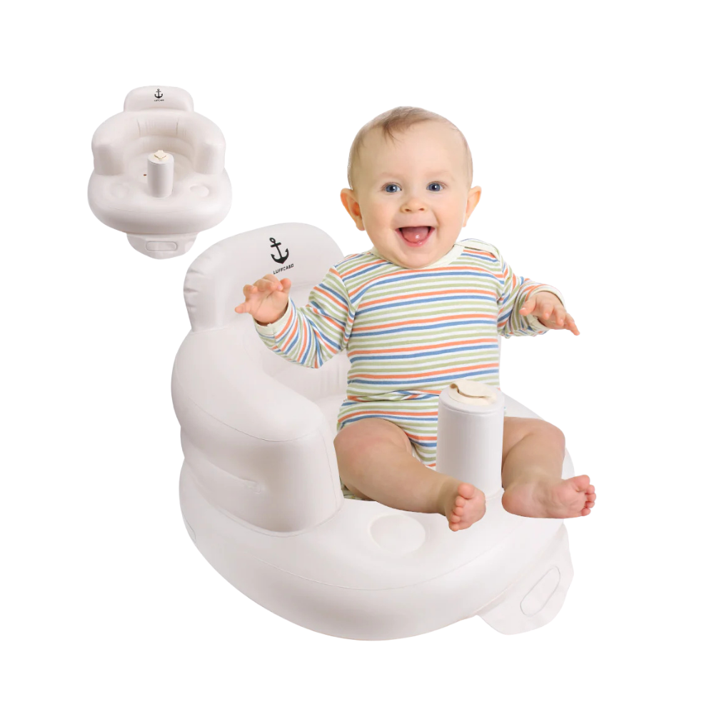 Baby sitting on a white inflatable seat with a smiling baby