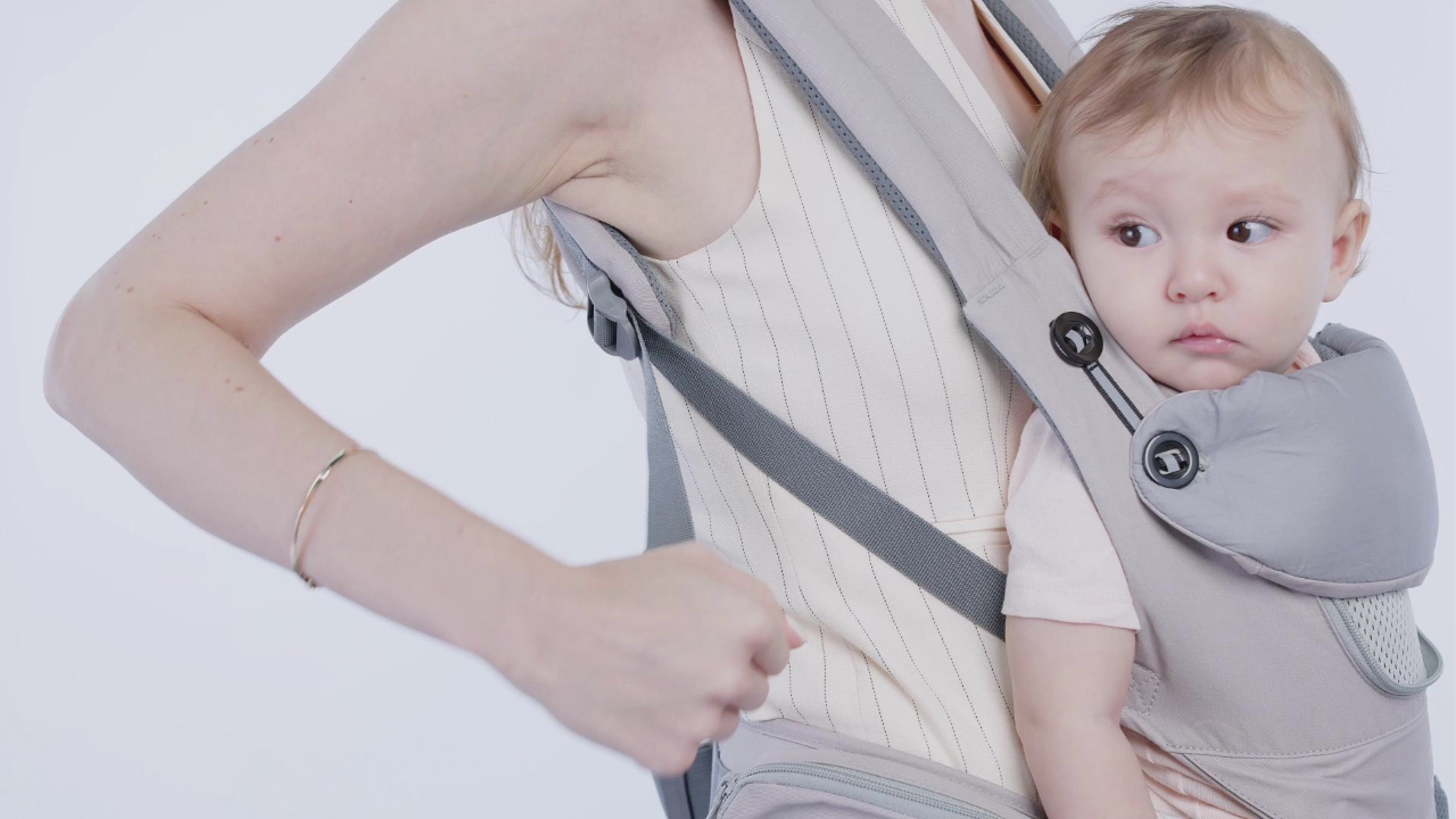 Load video: LUFFCABO ergonomic baby carrier, designed with an ergonomic seat for optimal support and comfort, perfect for keeping your baby cozy while you carry them with ease